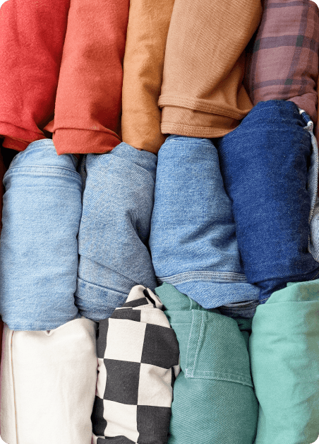 A neatly organized drawer of folded clothes